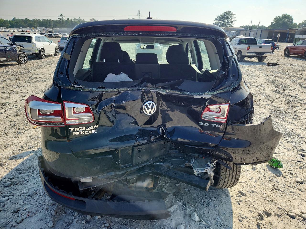 2013 Volkswagen Tiguan S Black vin: WVGAV7AX8DW553973