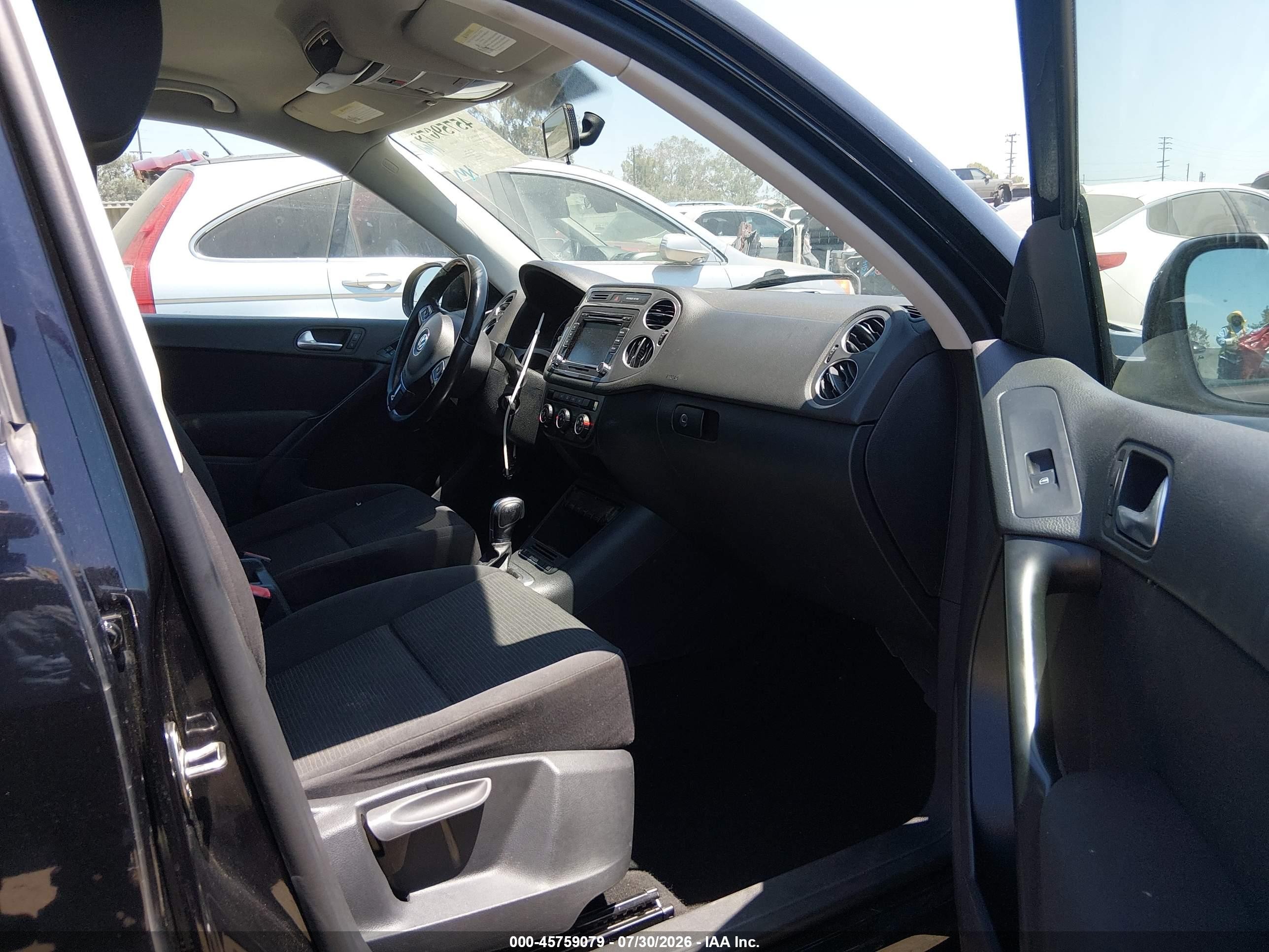 2015 Volkswagen Tiguan S Black vin: WVGAV7AXXFW566632