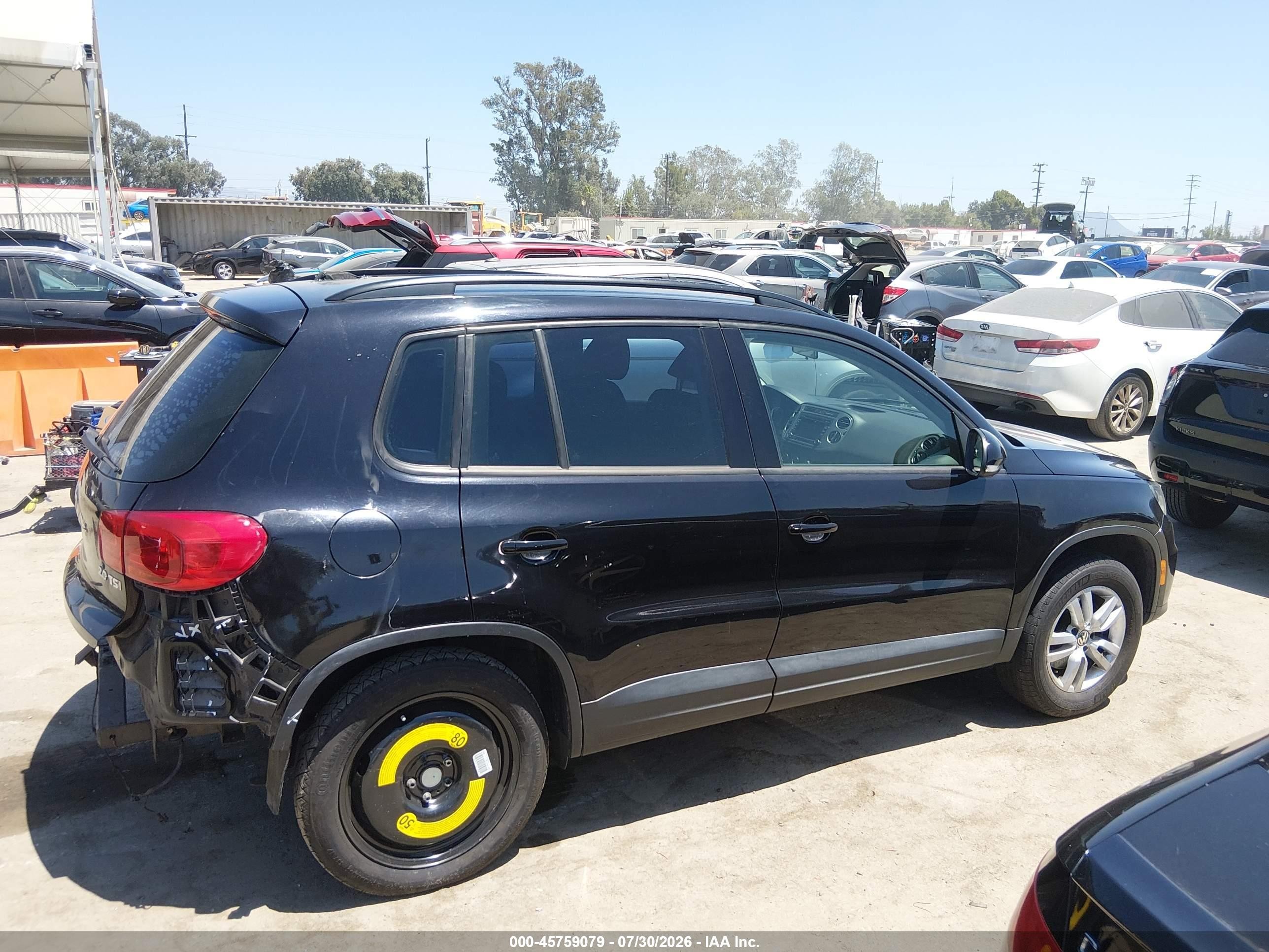 2015 Volkswagen Tiguan S Black vin: WVGAV7AXXFW566632
