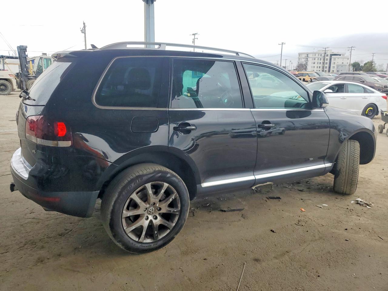 2010 Volkswagen Touareg V6 Черный vin: WVGBF7A93AD003283
