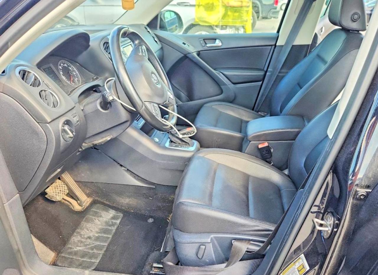 2014 Volkswagen Tiguan S Черный vin: WVGBV3AX0EW534591