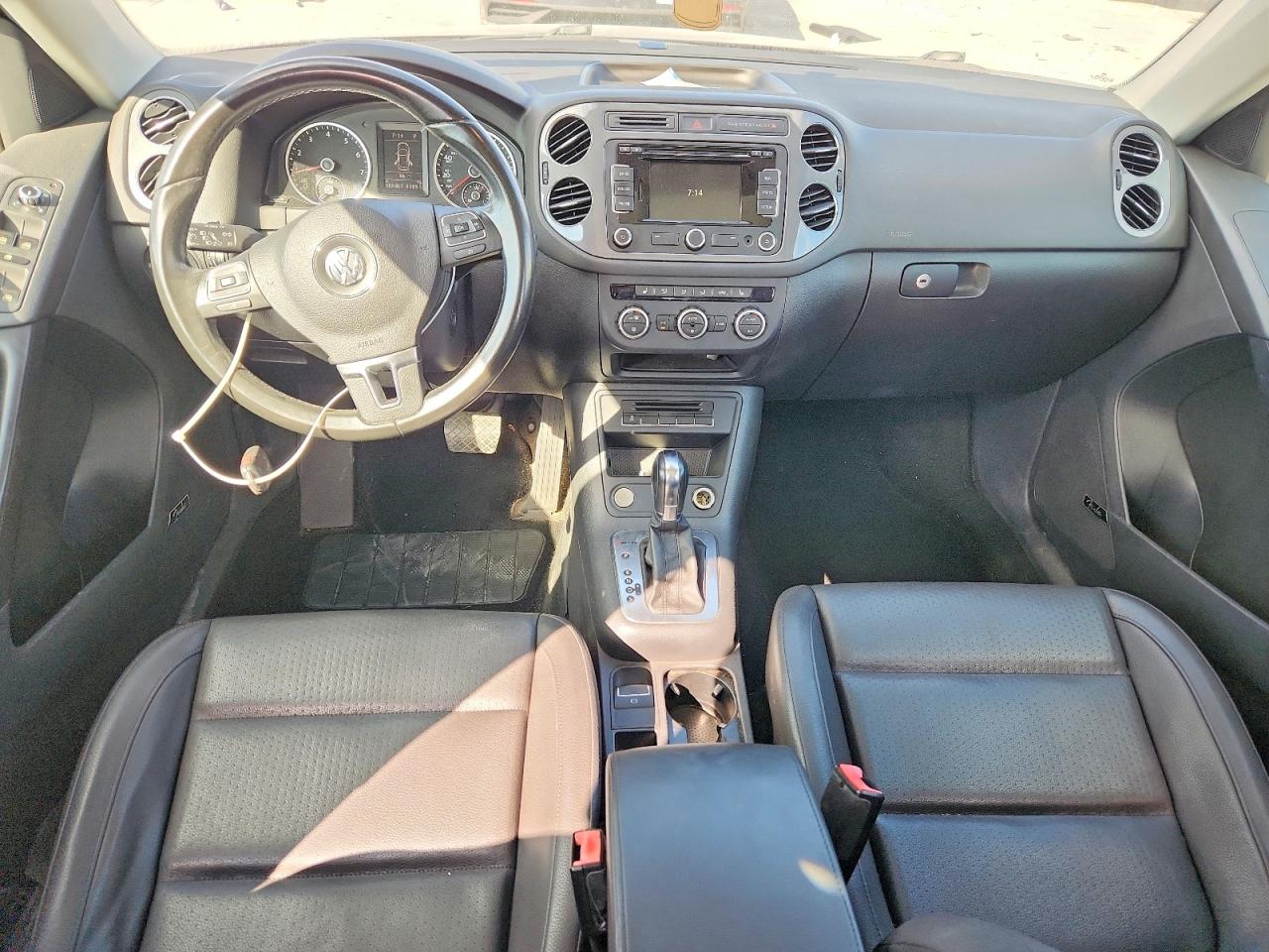 2014 Volkswagen Tiguan S Черный vin: WVGBV3AX0EW534591