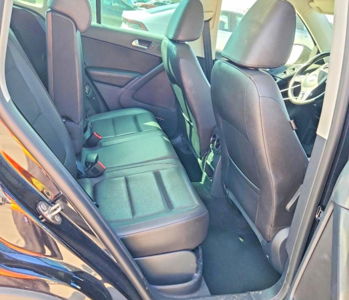 2014 Volkswagen Tiguan S Черный vin: WVGBV3AX0EW534591