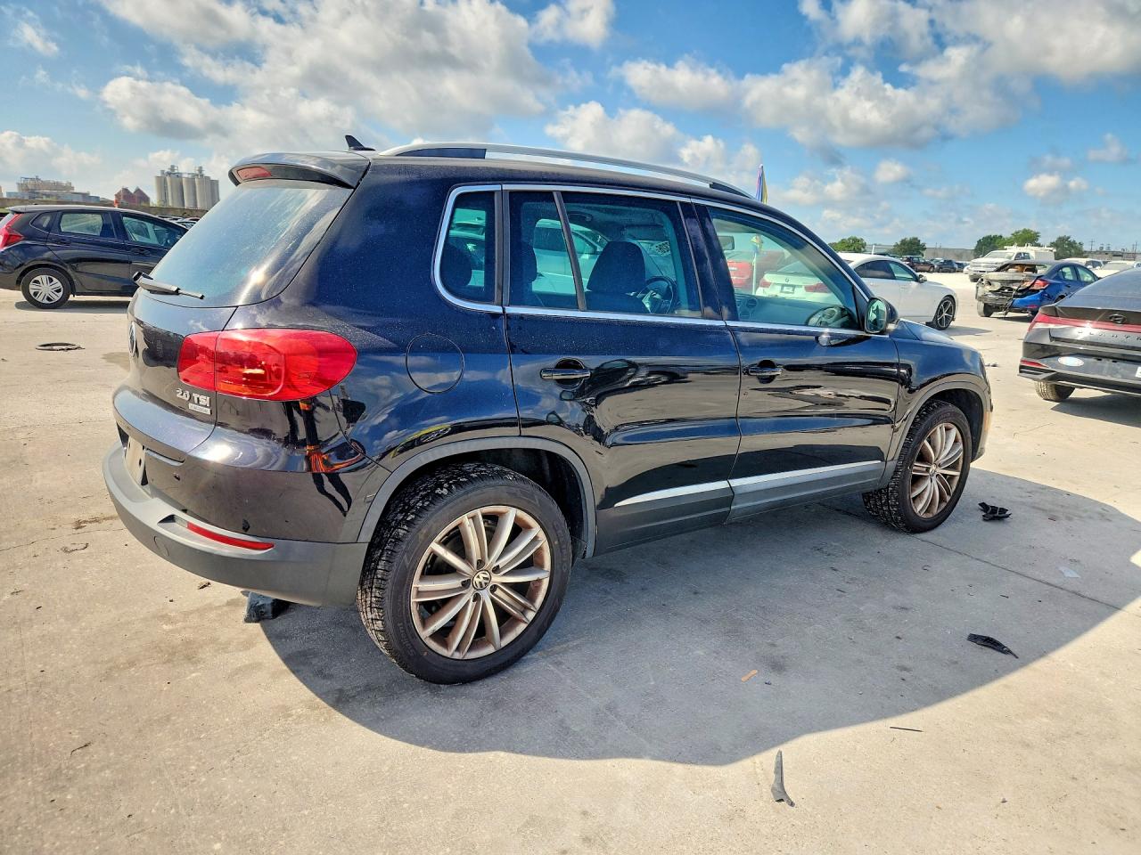 2014 Volkswagen Tiguan S Черный vin: WVGBV3AX0EW534591