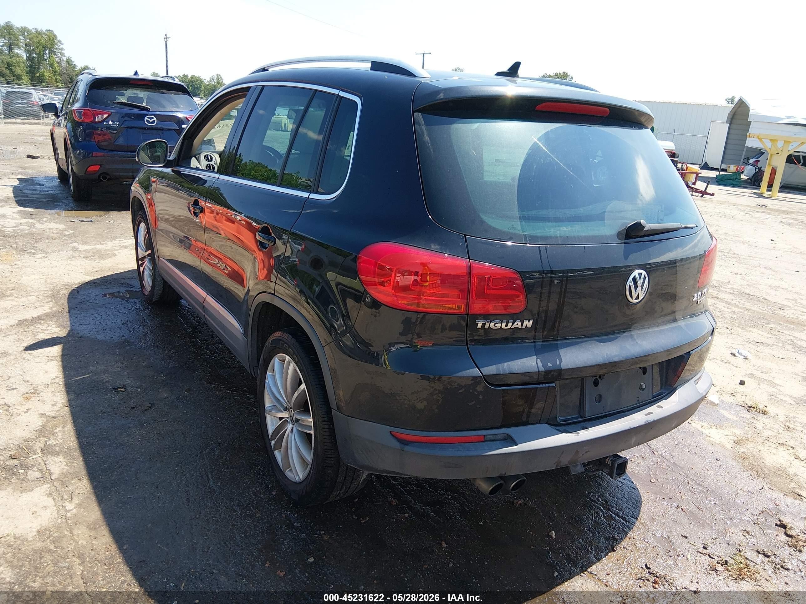 2014 Volkswagen Tiguan Sel Черный vin: WVGBV3AX7EW549282