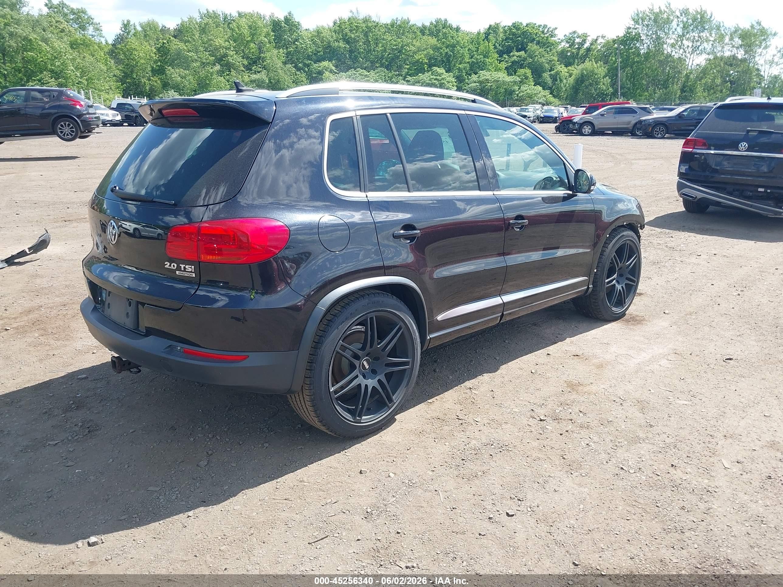 2014 Volkswagen Tiguan R-line Черный vin: WVGBV3AX8EW034890