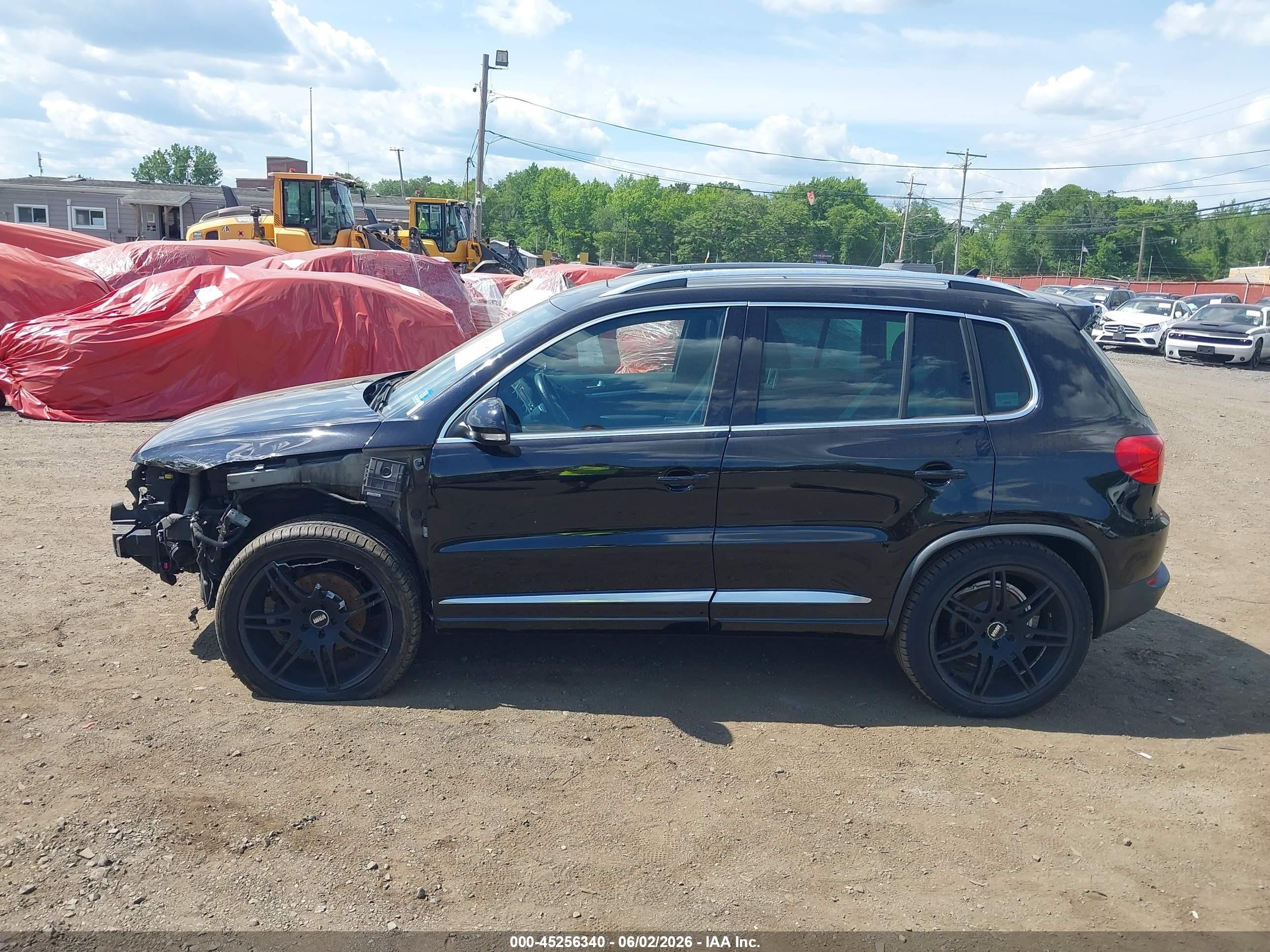 2014 Volkswagen Tiguan R-line Черный vin: WVGBV3AX8EW034890