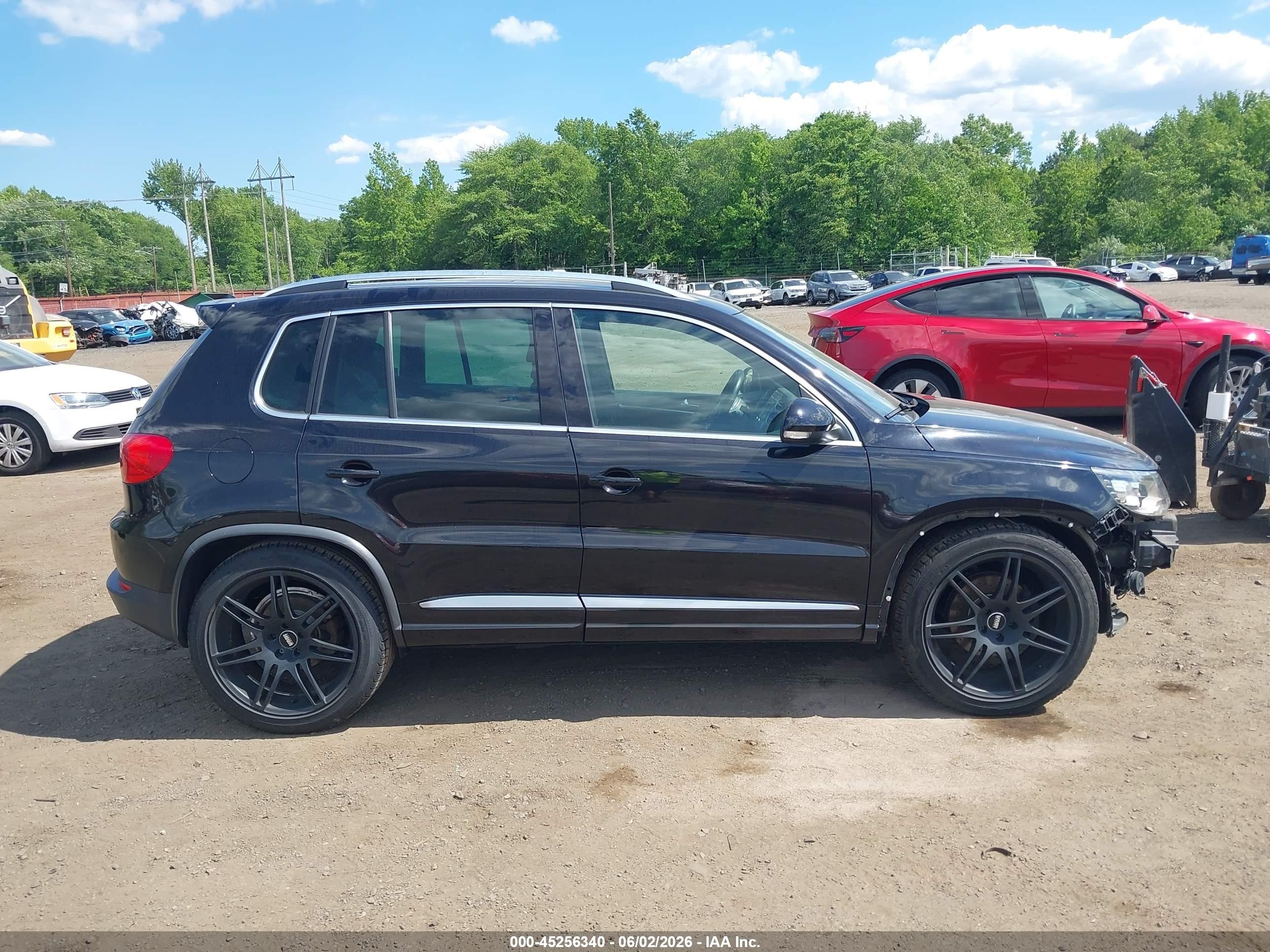 2014 Volkswagen Tiguan R-line Черный vin: WVGBV3AX8EW034890