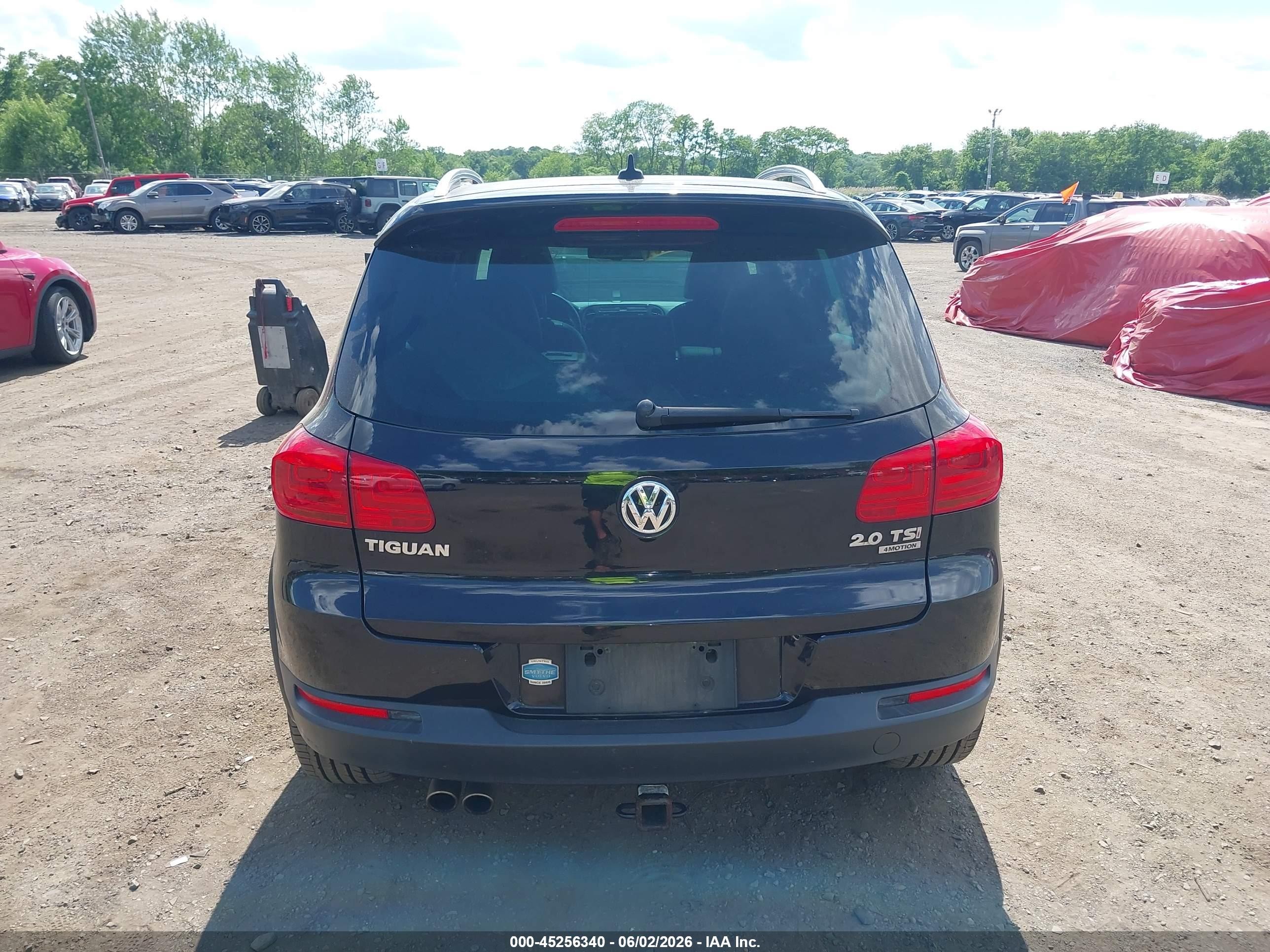 2014 Volkswagen Tiguan R-line Черный vin: WVGBV3AX8EW034890