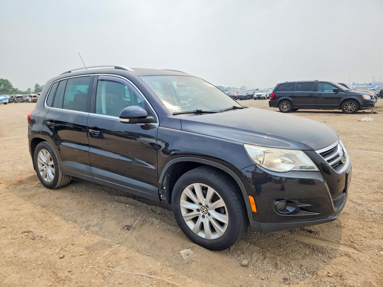 2009 Volkswagen Tiguan Se Black vin: WVGBV75NX9W528495
