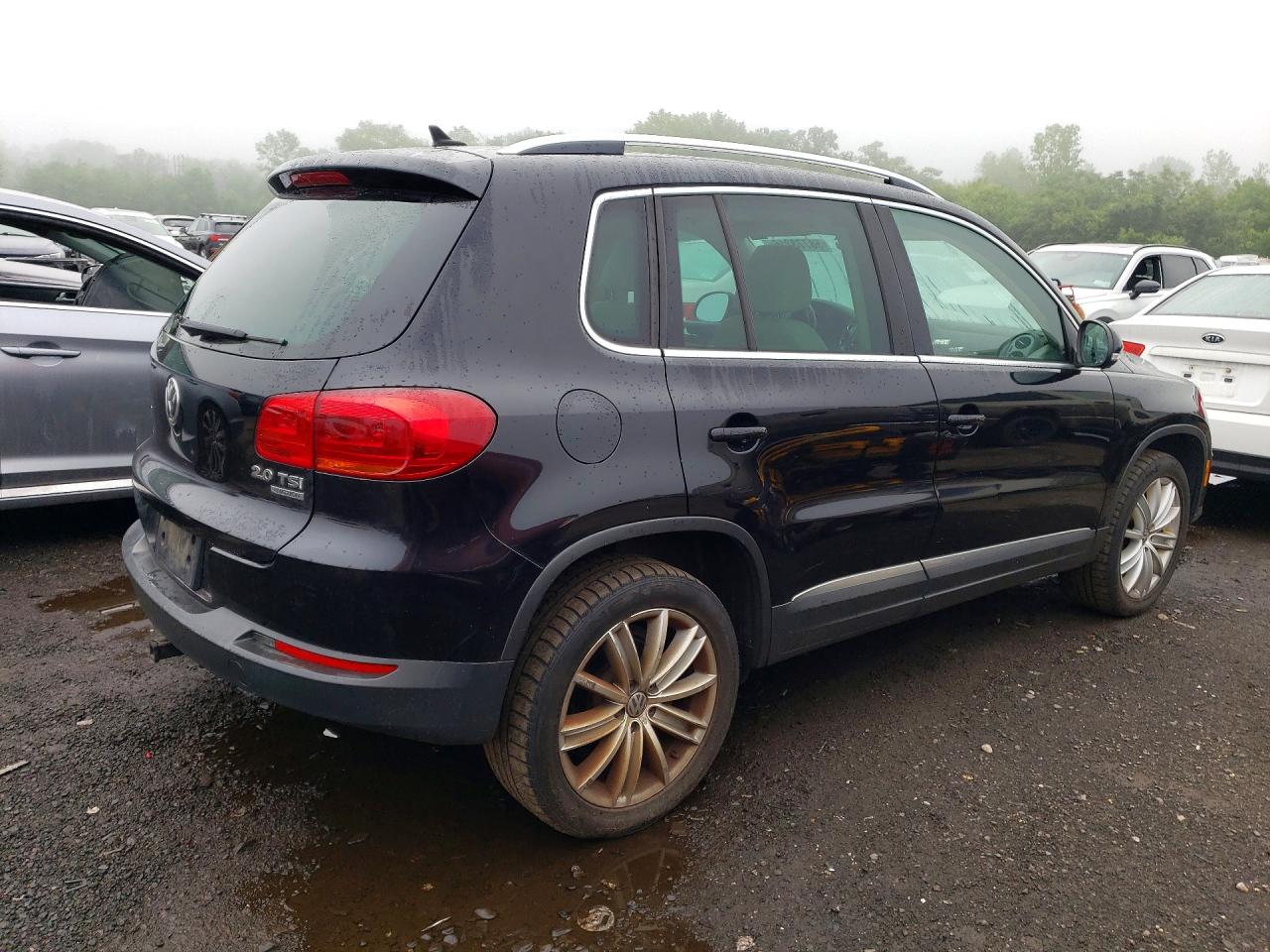 2012 Volkswagen Tiguan S Черный vin: WVGBV7AX0CW572052
