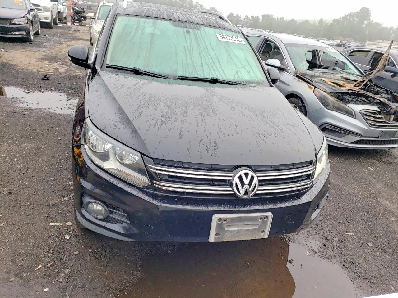 2012 Volkswagen Tiguan S Черный vin: WVGBV7AX0CW572052