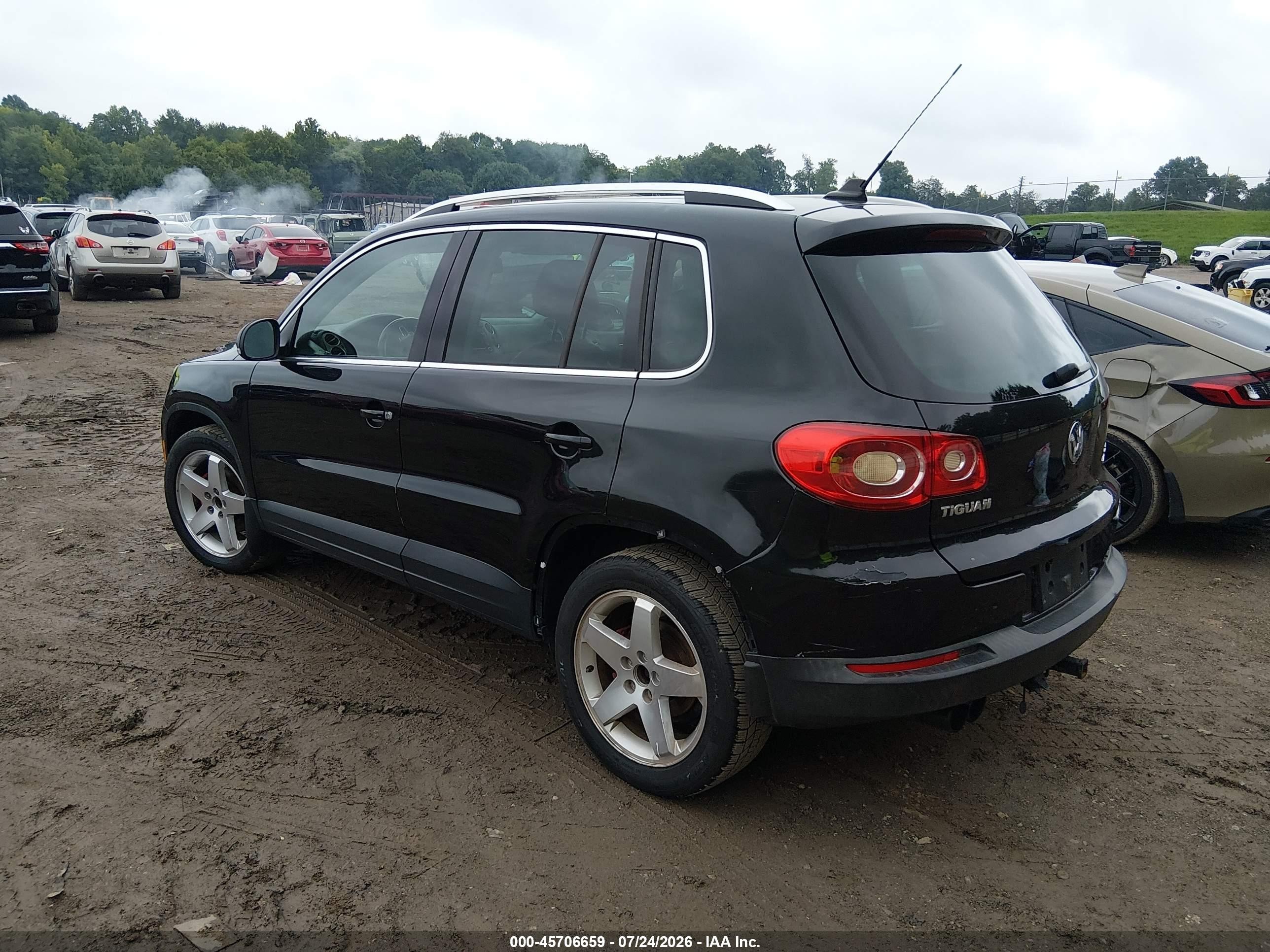2011 Volkswagen Tiguan Sel Черный vin: WVGBV7AX1BW525014