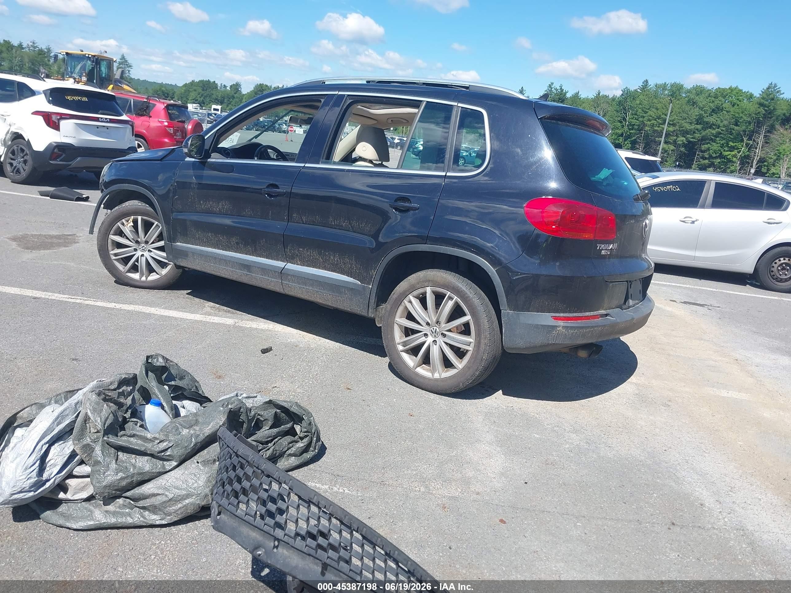 2012 Volkswagen Tiguan Se Black vin: WVGBV7AX2CW609358