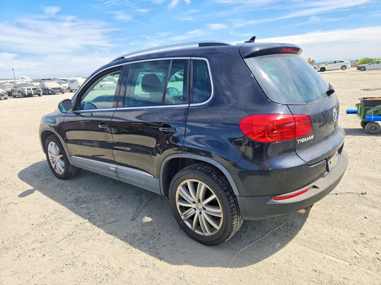 2012 Volkswagen Tiguan Черный vin: WVGBV7AX4CW518544