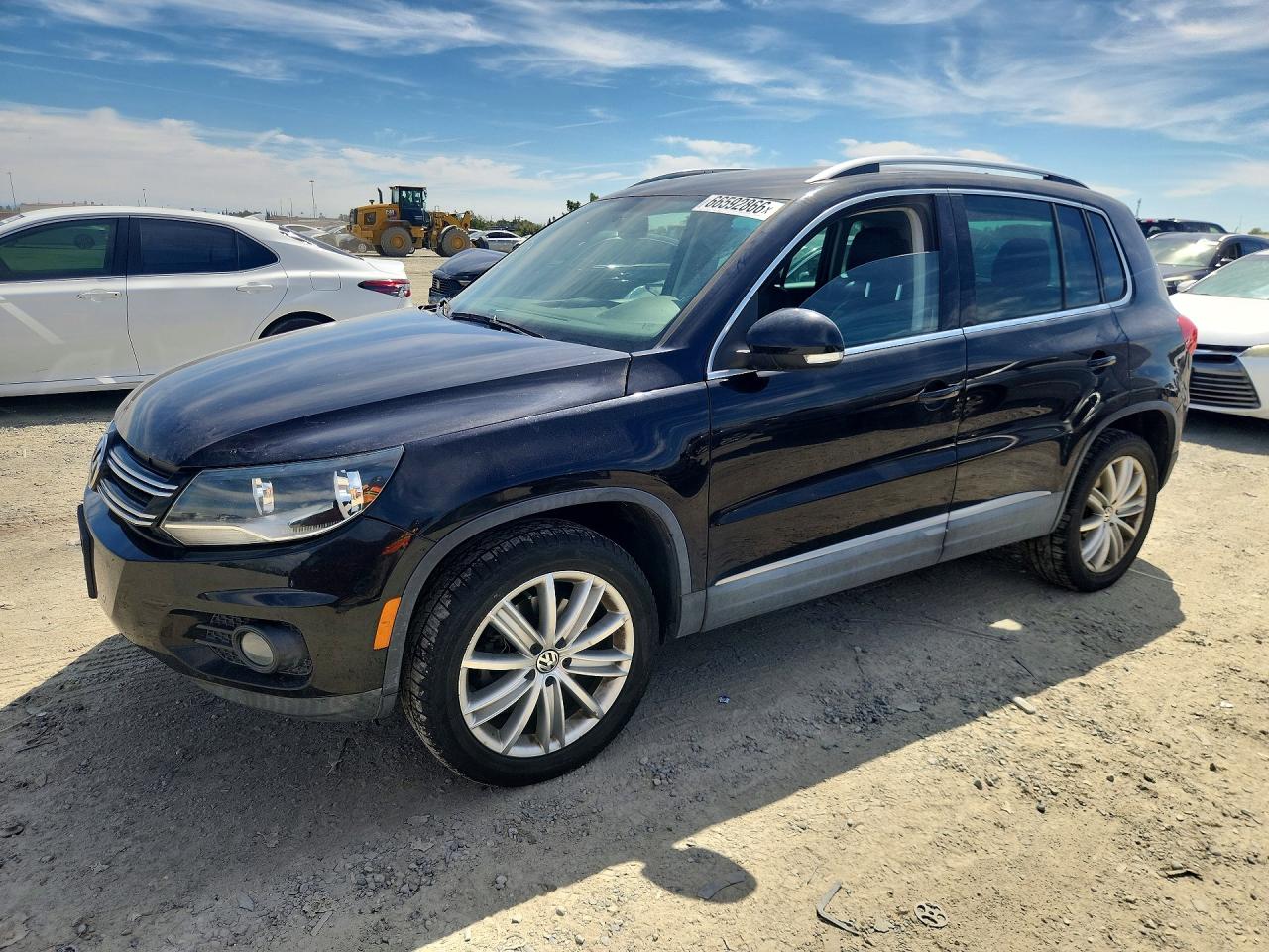 2012 Volkswagen Tiguan Черный vin: WVGBV7AX4CW518544