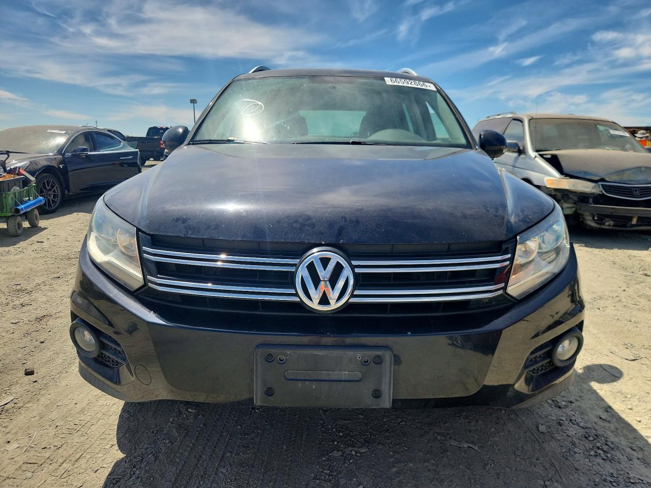2012 Volkswagen Tiguan Черный vin: WVGBV7AX4CW518544