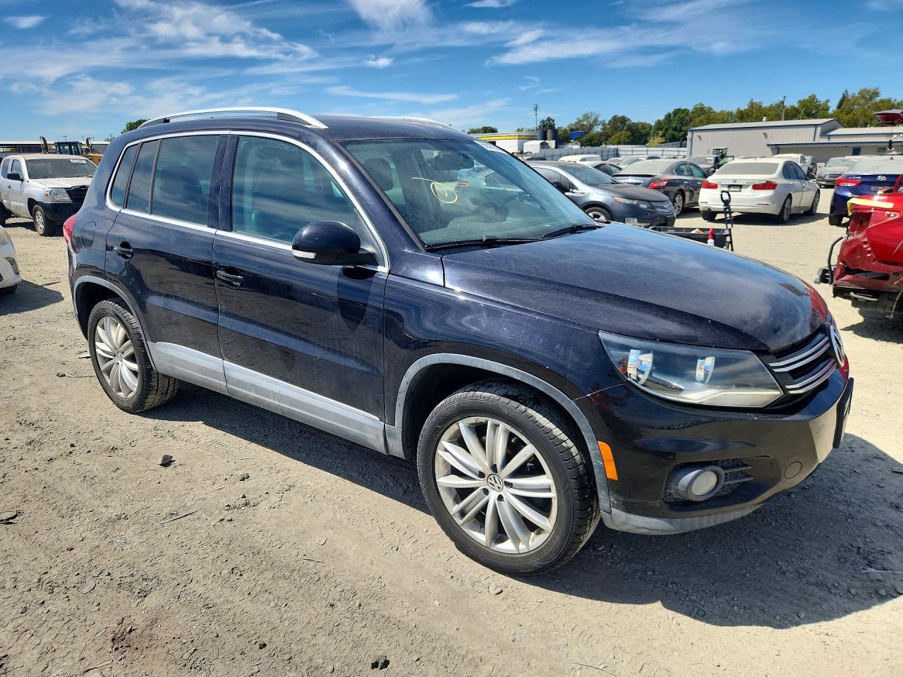 2012 Volkswagen Tiguan Черный vin: WVGBV7AX4CW518544