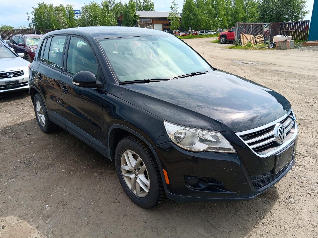 2011 Volkswagen Tiguan S Black vin: WVGBV7AX5BW557450