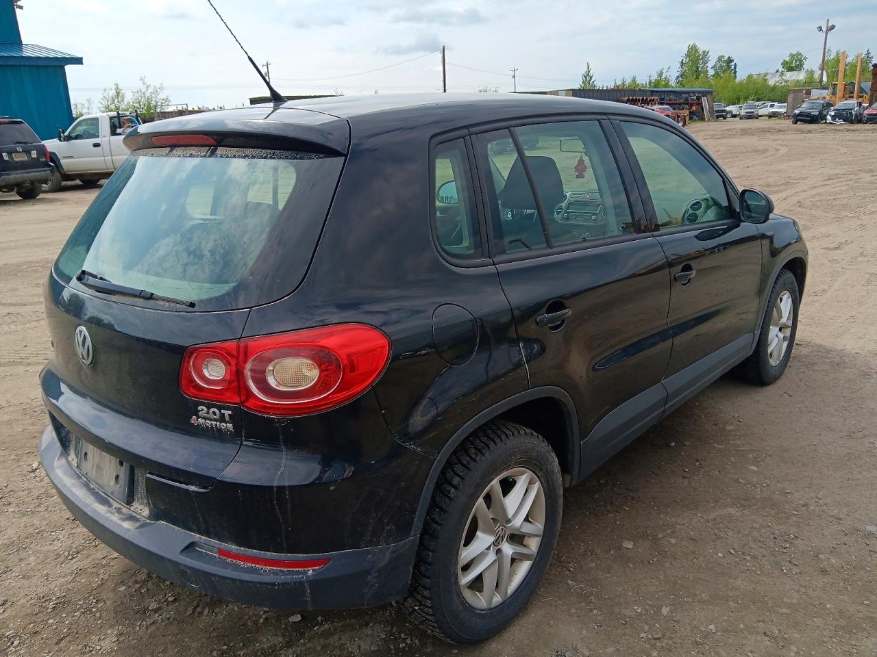 2011 Volkswagen Tiguan S Black vin: WVGBV7AX5BW557450