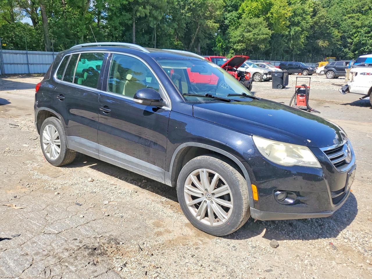 2011 Volkswagen Tiguan S Black vin: WVGBV7AX6BW500528