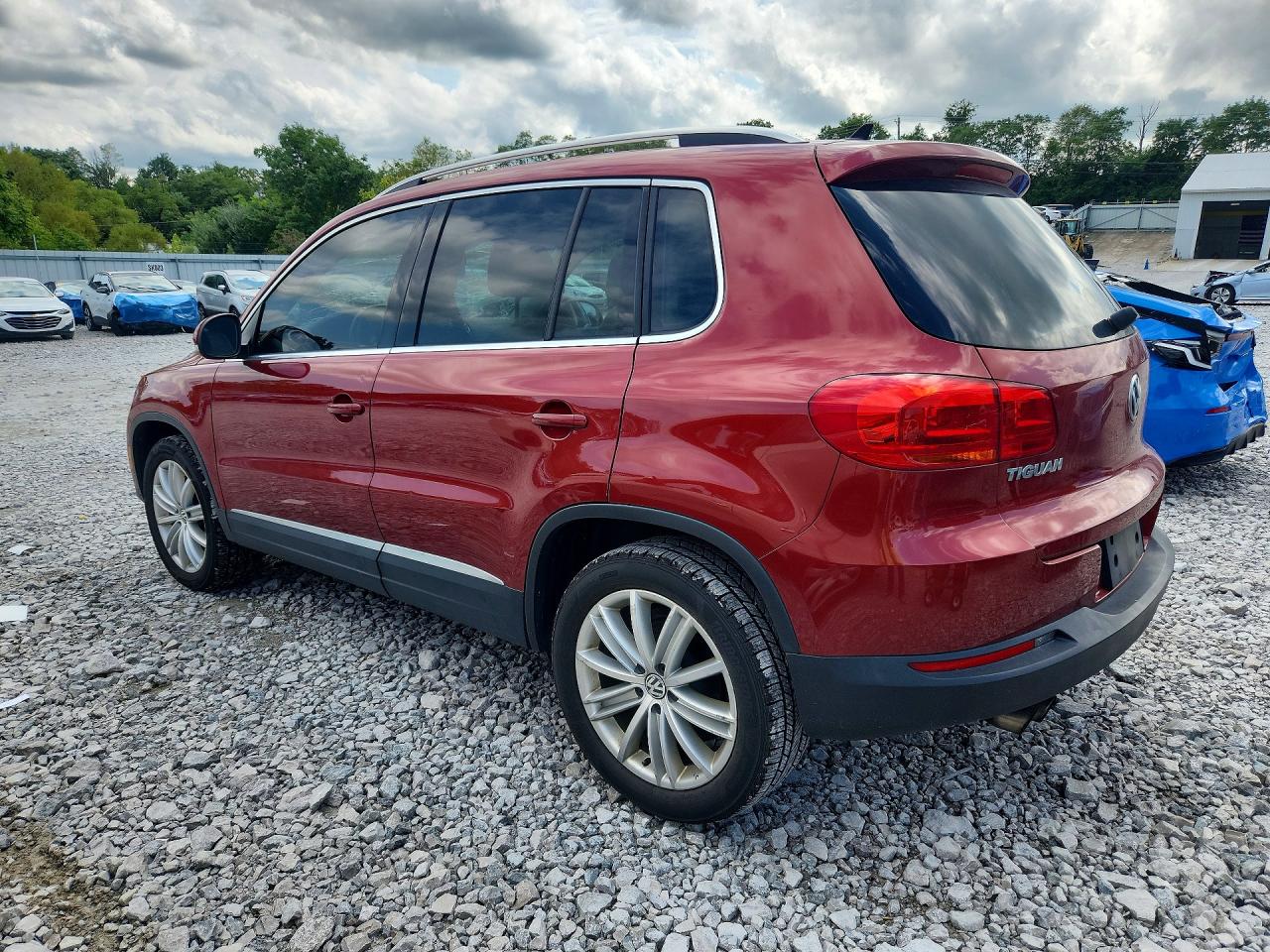 2015 Volkswagen Tiguan S Red vin: WVGBV7AX9FW109203