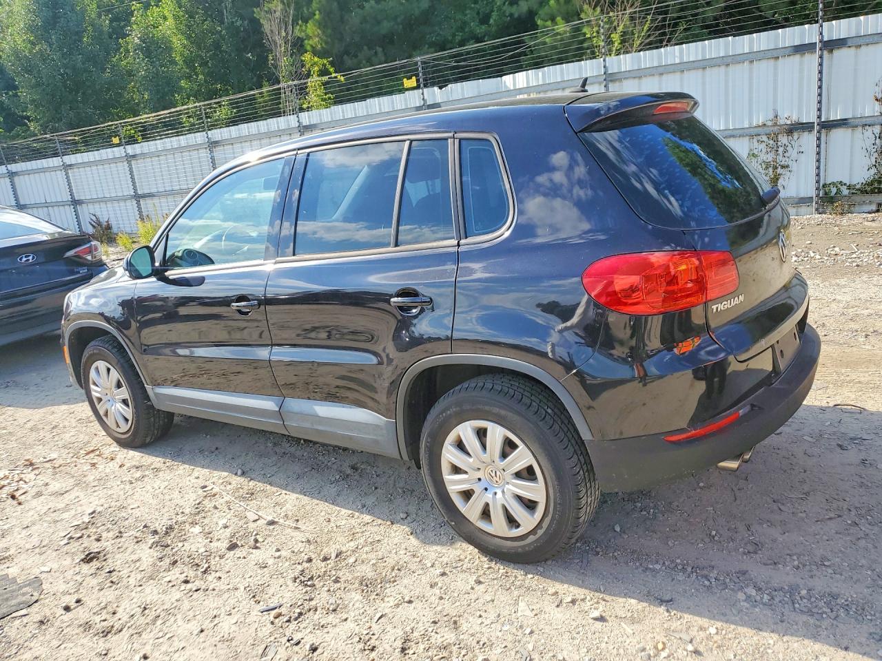 2014 Volkswagen Tiguan S Black vin: WVGCV3AX4EW594491