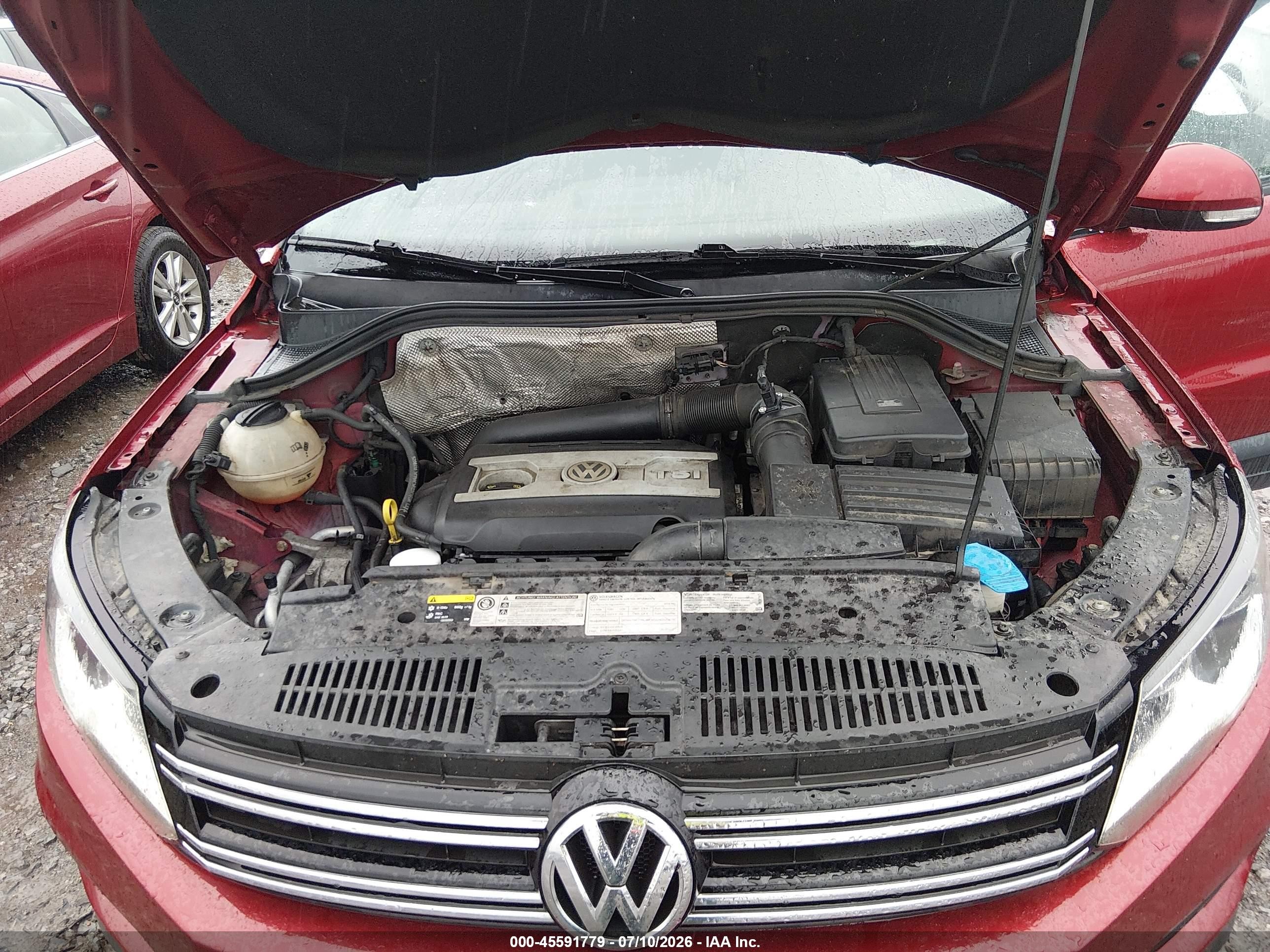 2014 Volkswagen Tiguan S Burgundy vin: WVGCV3AX7EW086838