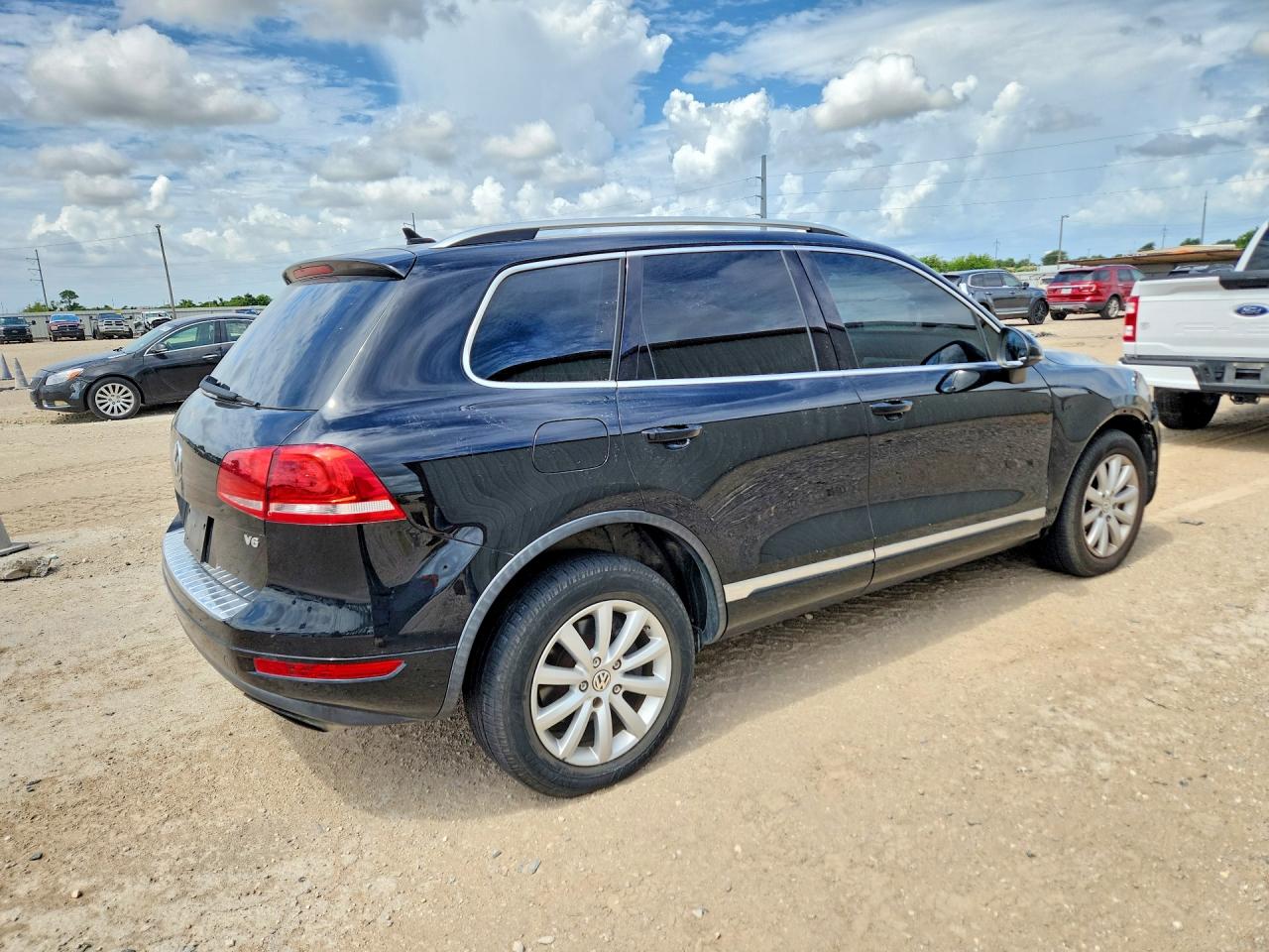 2012 Volkswagen Touareg V6 Черный vin: WVGEF9BP3CD009478
