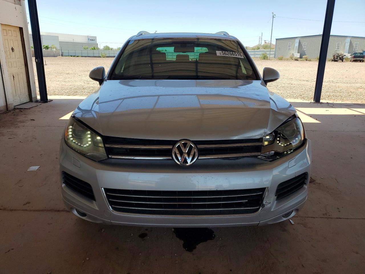 2013 Volkswagen Touareg Sport Серебряный vin: WVGEF9BP7DD002017