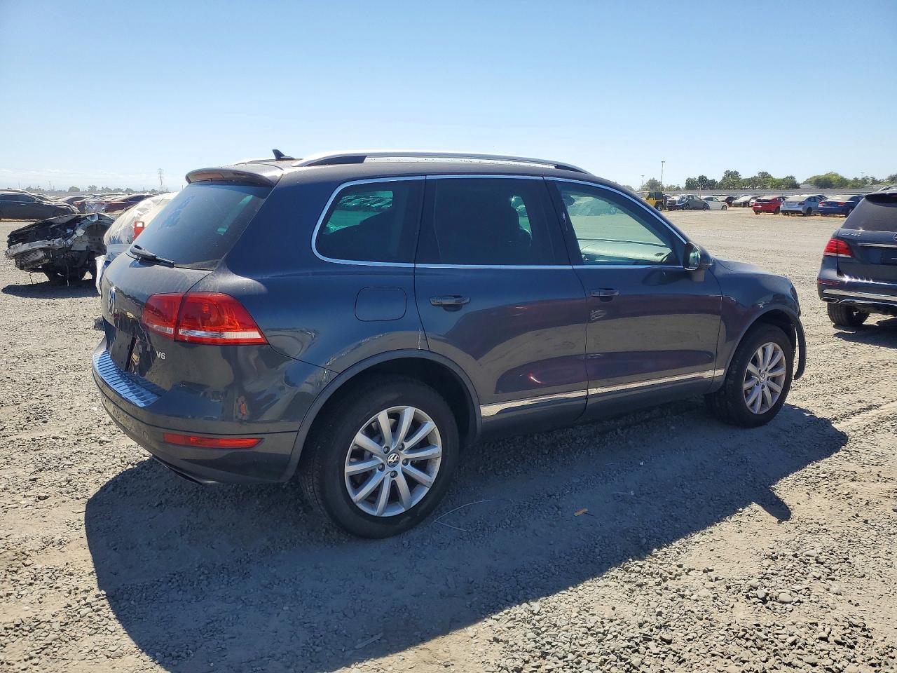 2011 Volkswagen Touareg V6 Серый vin: WVGFF9BP5BD004592