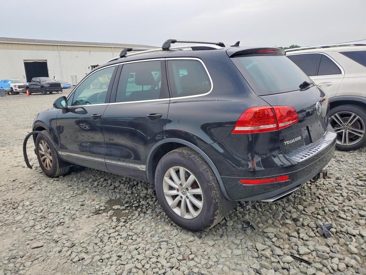 2011 Volkswagen Touareg V6 Black vin: WVGFF9BP8BD001072