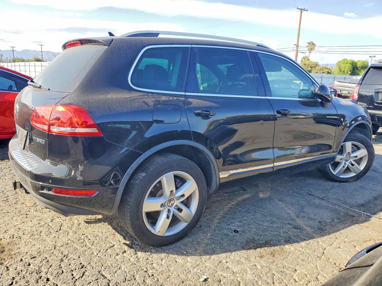 2011 Volkswagen Touareg Hybrid Black vin: WVGFG9BPXBD003385