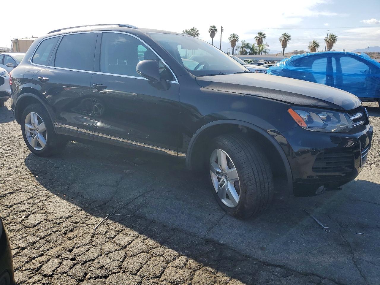 2011 Volkswagen Touareg Hybrid Black vin: WVGFG9BPXBD003385