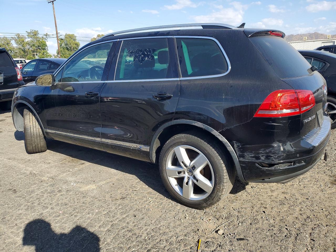 2011 Volkswagen Touareg Hybrid Black vin: WVGFG9BPXBD003385