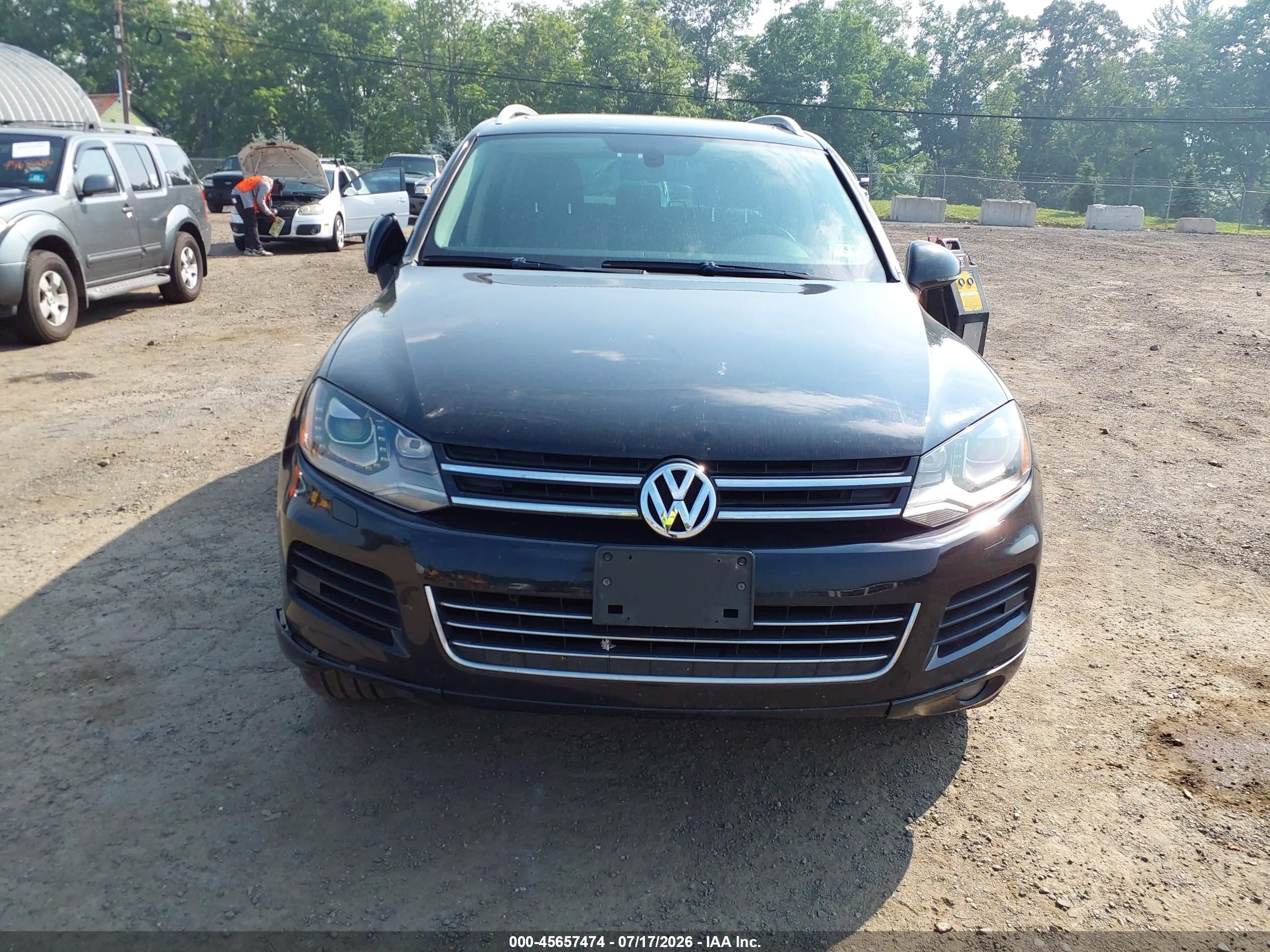 2012 Volkswagen Touareg Tdi Executive Черный vin: WVGFK9BPXCD000292