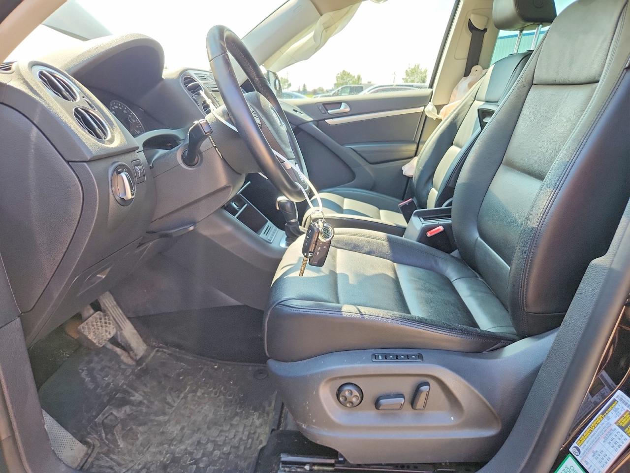 2013 Volkswagen Tiguan S Черный vin: WVGJV7AX6DW524682