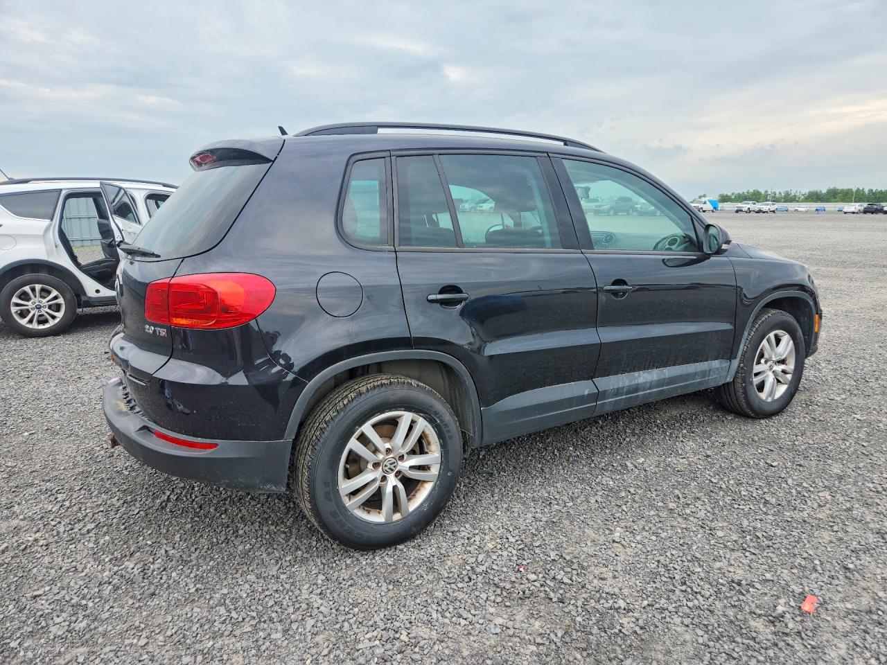 2014 Volkswagen Tiguan S Black vin: WVGKV3AX1EW616362