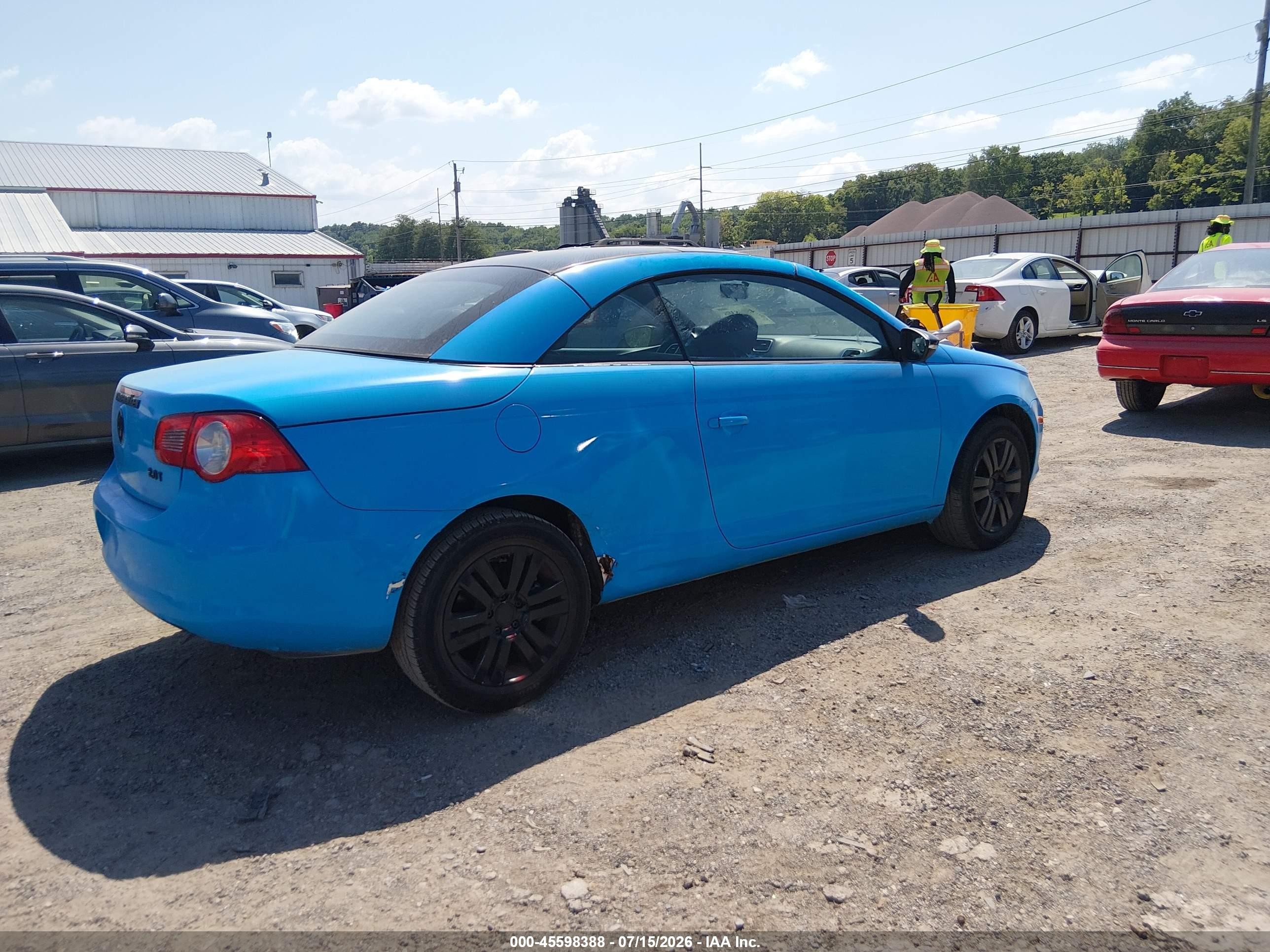 2009 Volkswagen Eos Komfort Blue vin: WVWAA71F39V015296