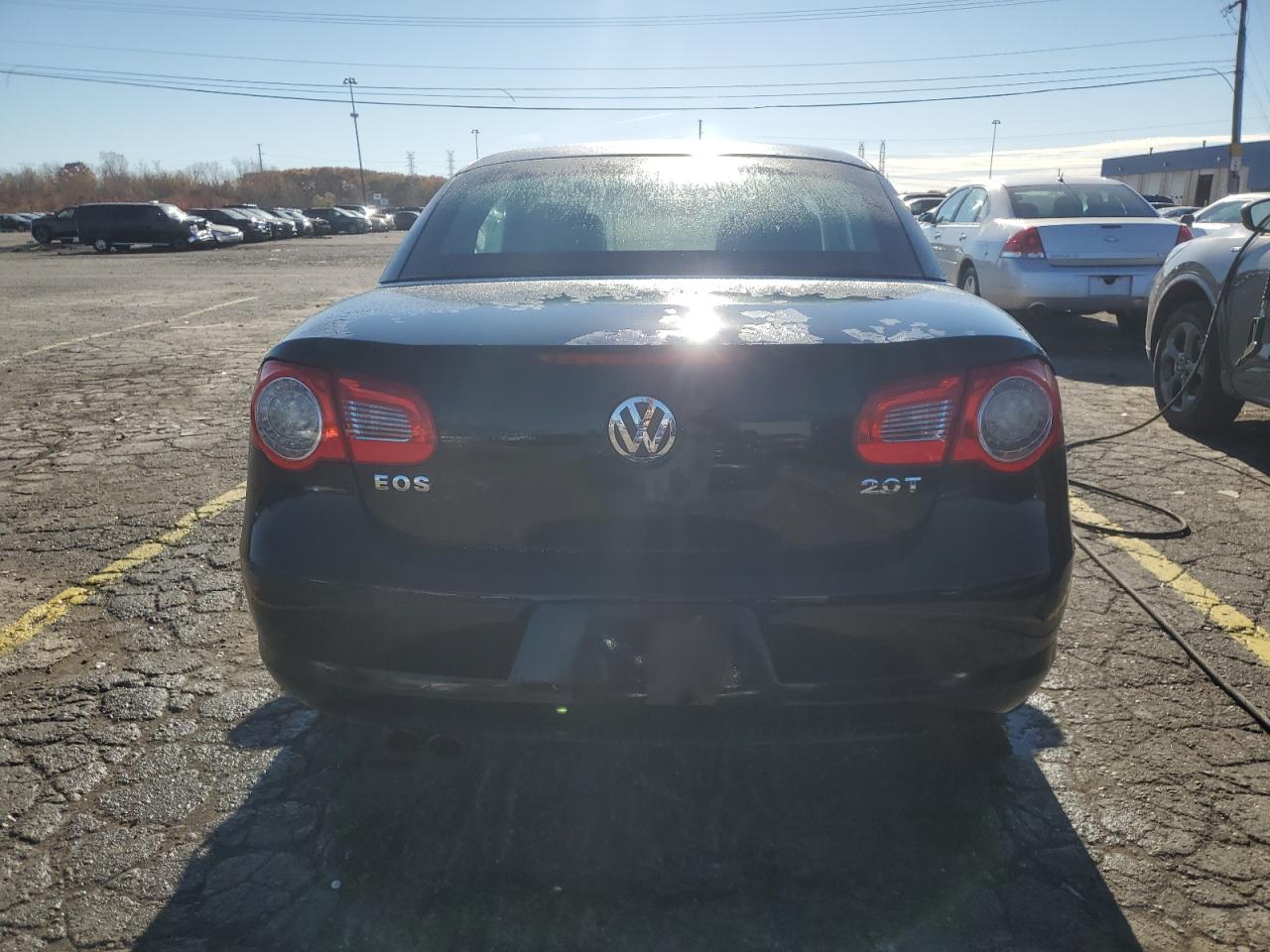 2009 Volkswagen Eos Turbo Черный vin: WVWAA71F69V008116