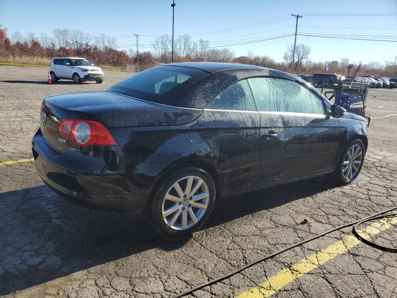 2009 Volkswagen Eos Turbo Черный vin: WVWAA71F69V008116