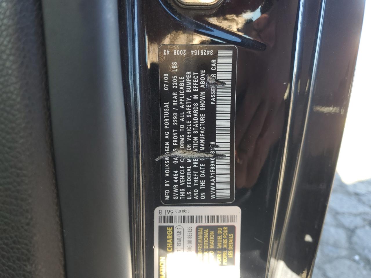 2009 Volkswagen Eos Turbo Черный vin: WVWAA71F69V008116