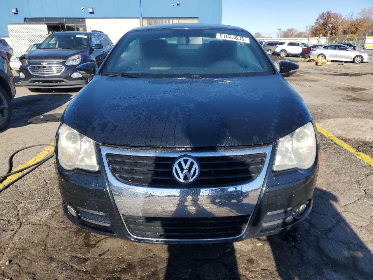 2009 Volkswagen Eos Turbo Черный vin: WVWAA71F69V008116