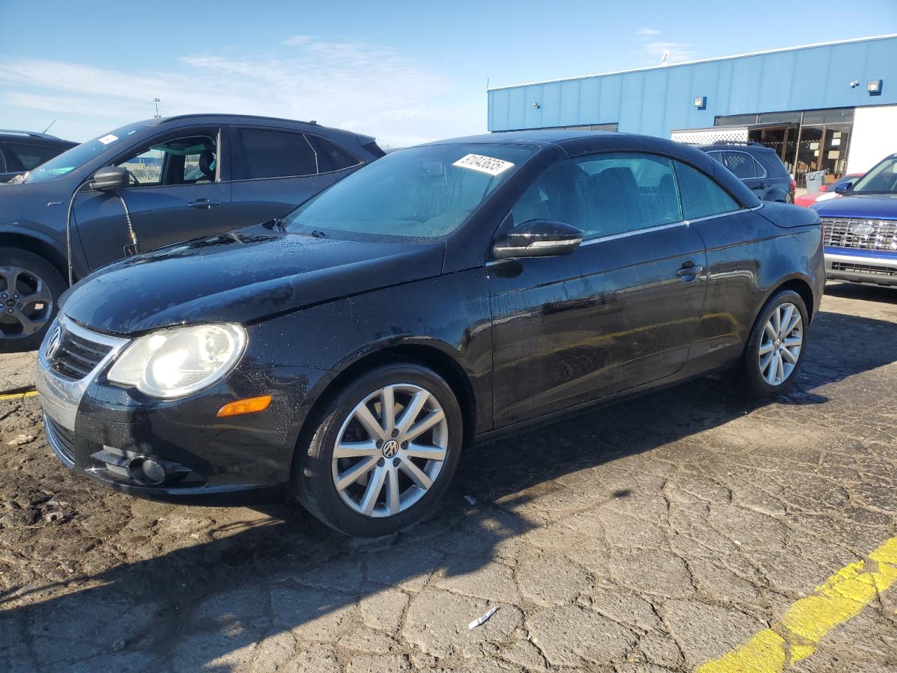 2009 Volkswagen Eos Turbo Black vin: WVWAA71F69V008116