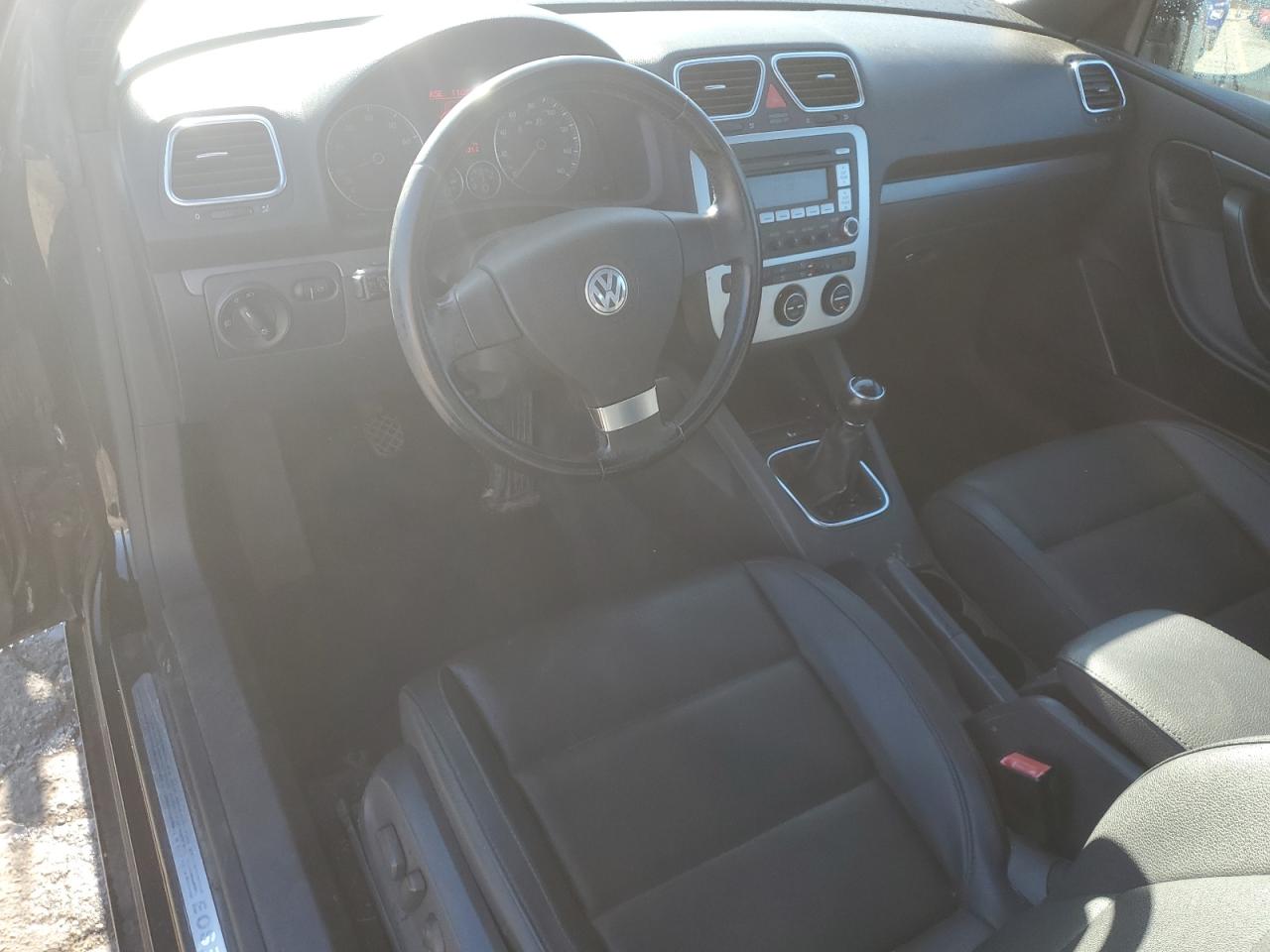 2009 Volkswagen Eos Turbo Черный vin: WVWAA71F69V008116