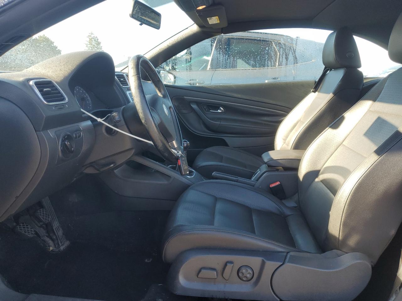 2009 Volkswagen Eos Turbo Черный vin: WVWAA71F69V008116