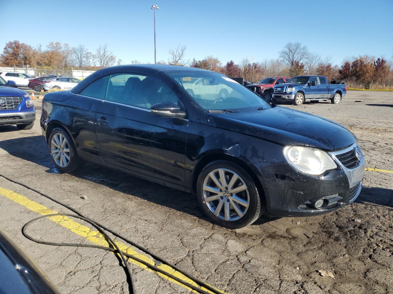 2009 Volkswagen Eos Turbo Черный vin: WVWAA71F69V008116