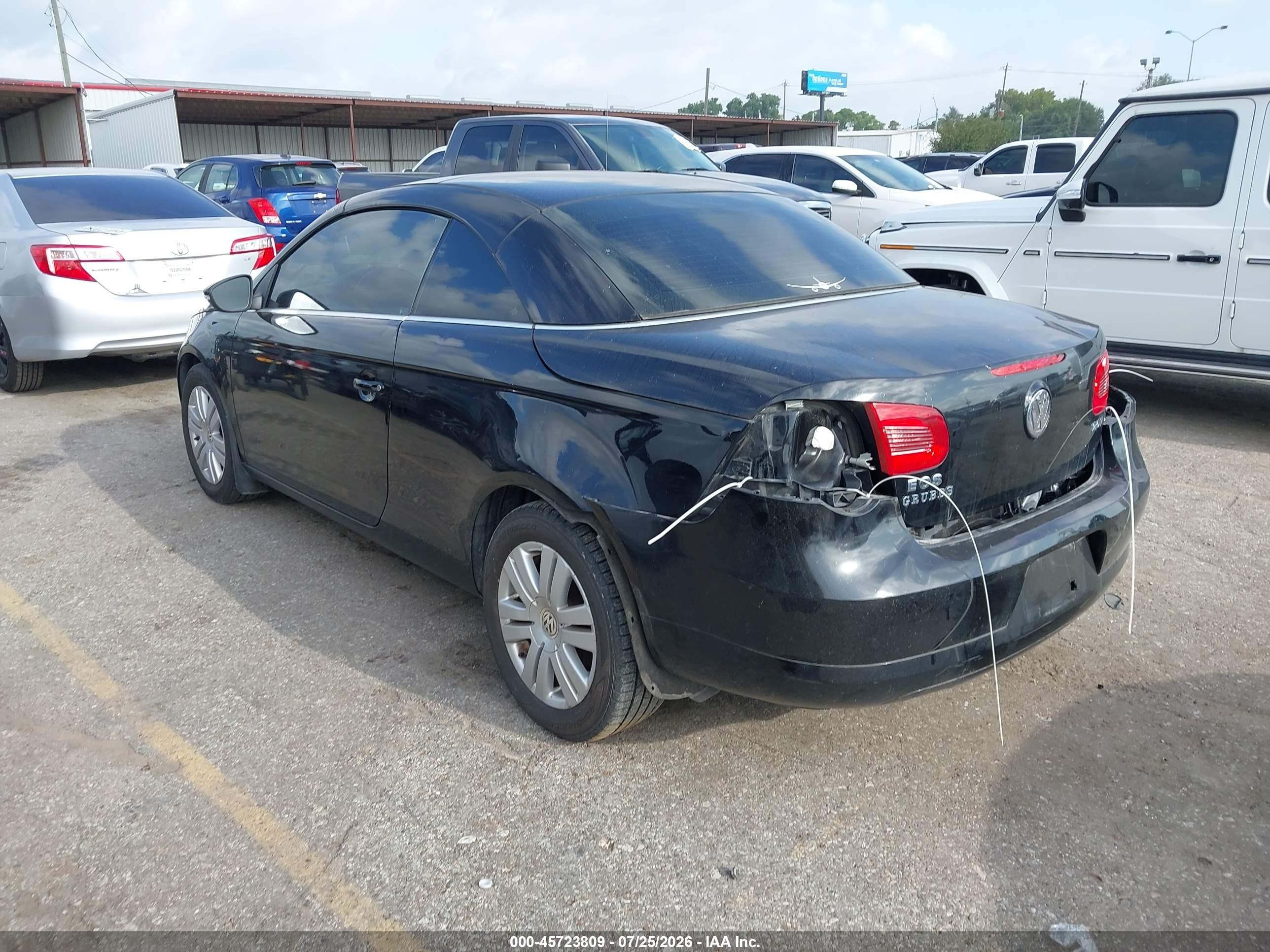 2009 Volkswagen Eos Komfort Черный vin: WVWAA71F79V021103