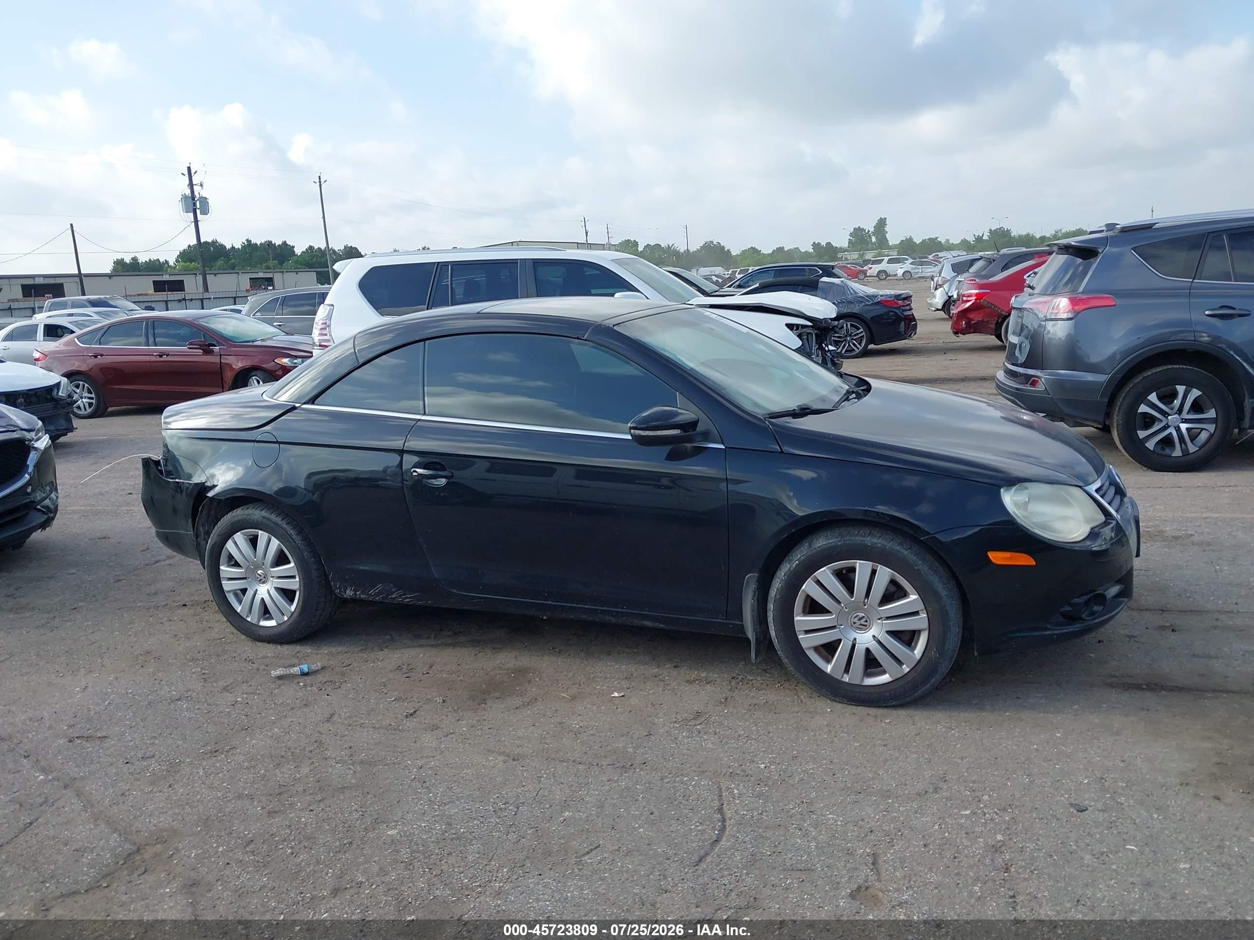 2009 Volkswagen Eos Komfort Черный vin: WVWAA71F79V021103