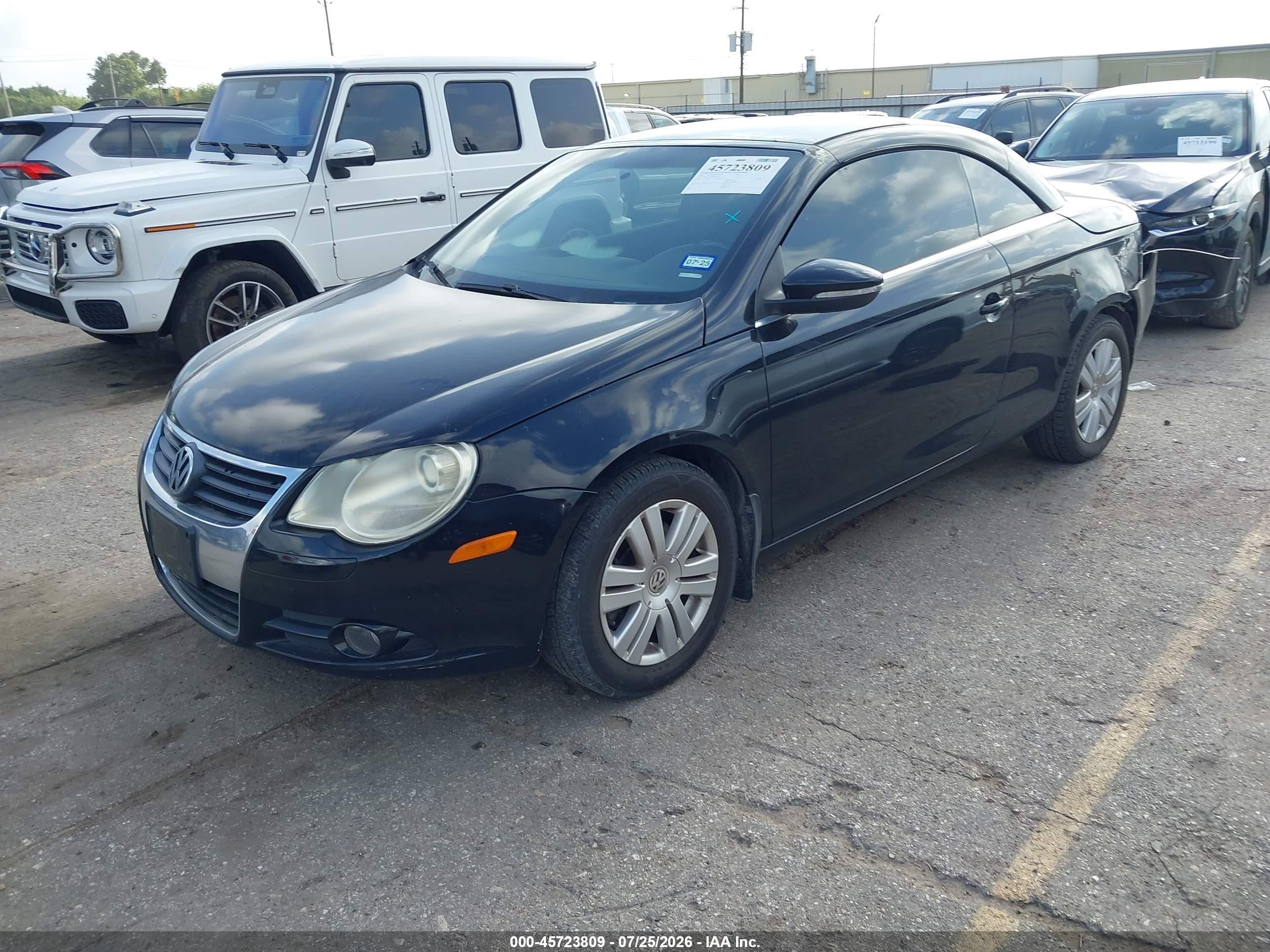 2009 Volkswagen Eos Komfort Черный vin: WVWAA71F79V021103